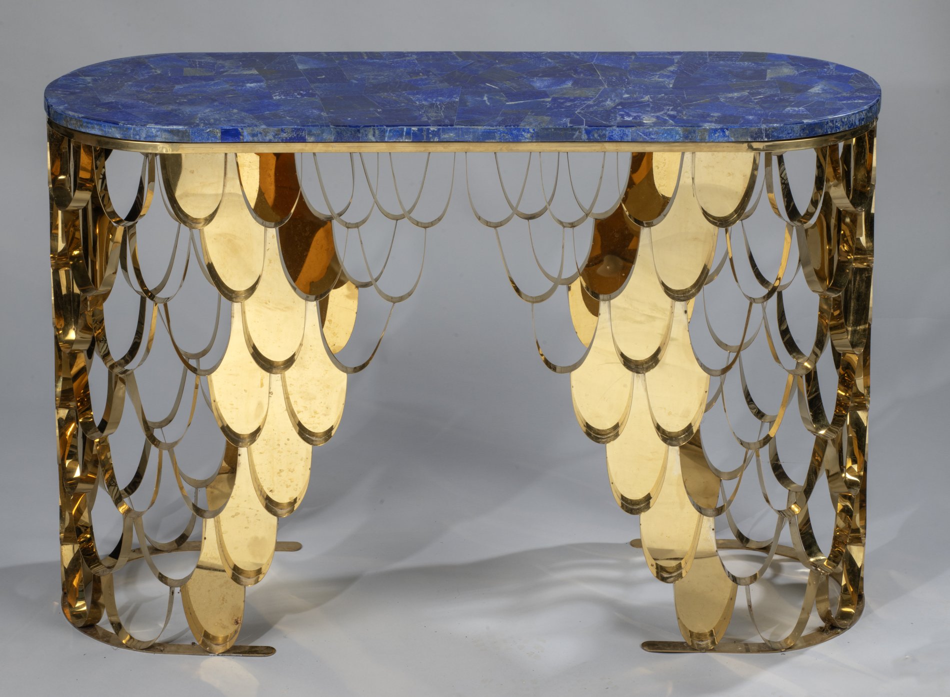 A brass and lapis lazuli veneered console table