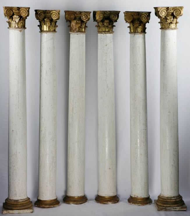A set of 6 wooden columns with Ionic capitals